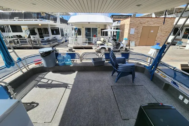 Slide: The Image of Sumerset Blue Moon Trip #11, 2008 houseboat deck with chairs and marina view. - 26