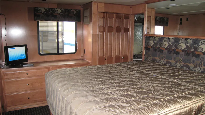 Slide: The Image of Luxurious bedroom interior of 2008 Sumerset Blue Moon Trip houseboat with cozy bedding. - 4
