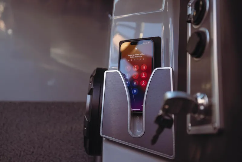 Slide: The Image of Smartphone dock in 2023 MasterCraft X26 boat cockpit. - 10