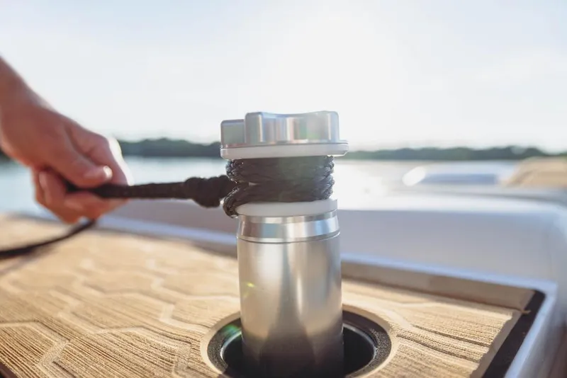 Slide: The Image of Close-up of a 2023 MasterCraft XT20 boat cleat with rope. - 15