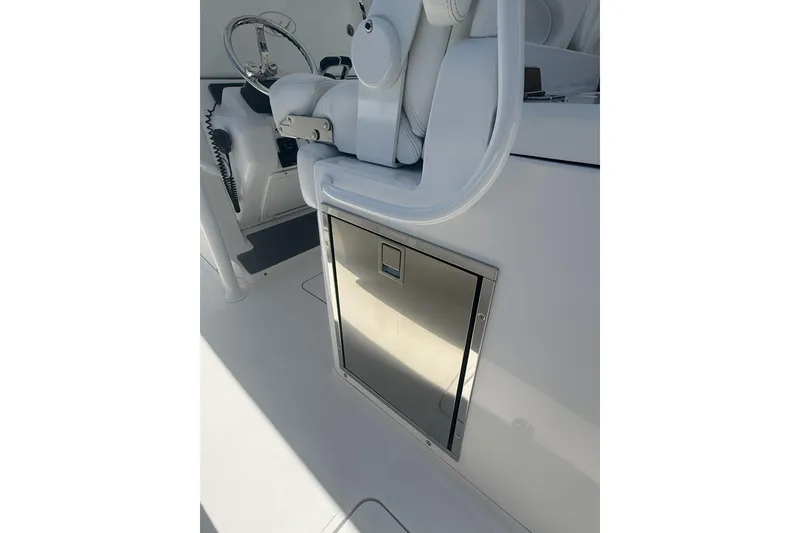 Slide: The Image of 2015 Southport 33 FE boat interior with stainless steel storage compartment. - 12