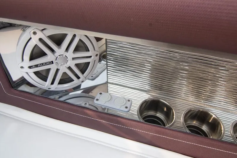 Slide: The Image of 2019 Donzi 41 GT boat interior with JL Audio speaker and cup holders. - 14