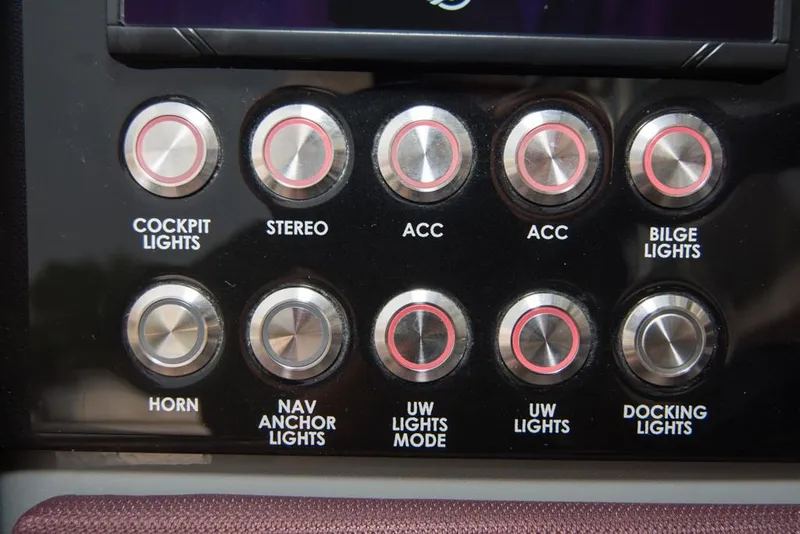 Slide: The Image of Control panel of a 2019 Donzi 41 GT boat with labeled buttons. - 28