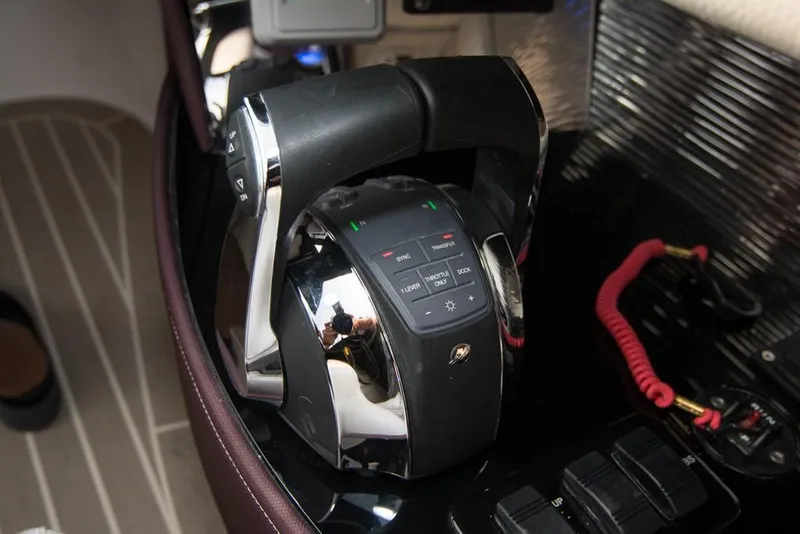 Slide: The Image of 2019 Donzi 41 GT boat throttle control system in cockpit. - 31
