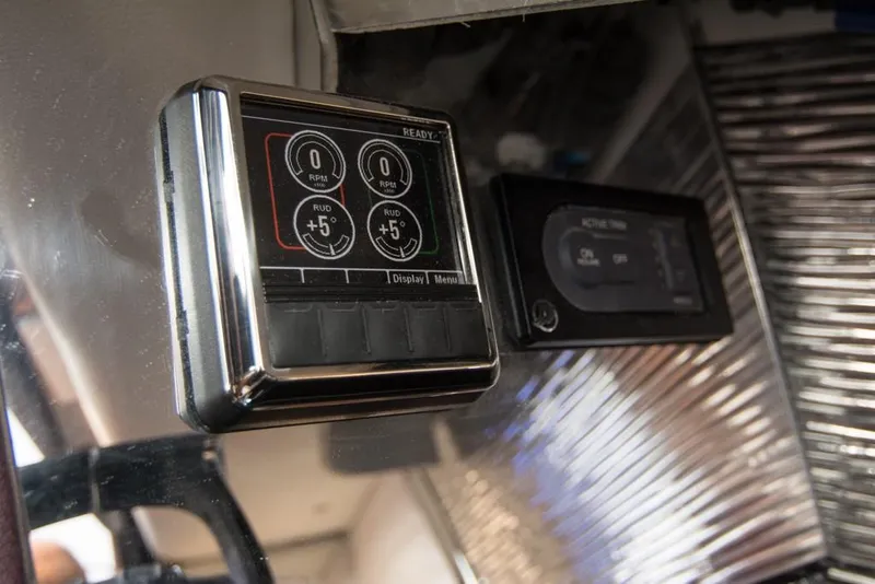 Slide: The Image of Control panel of a 2019 Donzi 41 GT boat. - 33