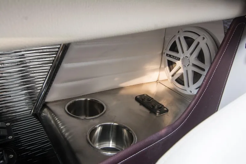 Slide: The Image of Interior of 2019 Donzi 41 GT boat with cup holders and speaker. - 35