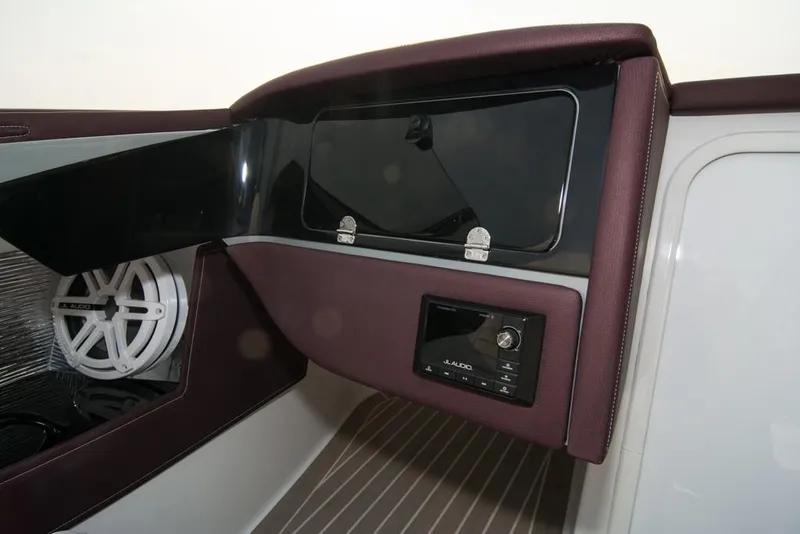 Slide: The Image of 2019 Donzi 41 GT interior with JL Audio speaker and control panel. - 38