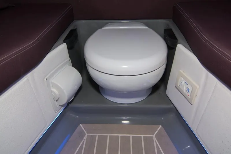 Slide: The Image of 2019 Donzi 41 GT boat interior bathroom with toilet and seating. - 49