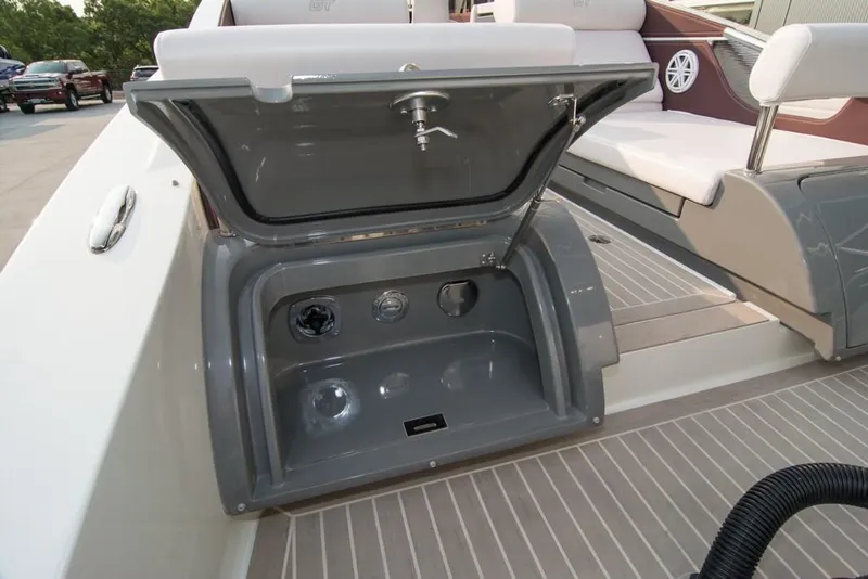 Slide: The Image of 2019 Donzi 41 GT boat with open storage compartment on deck. - 5
