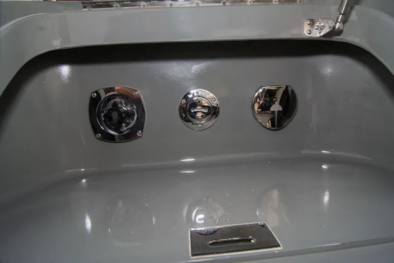 Slide: The Image of 2019 Donzi 41 GT boat control panel with chrome fittings. - 6
