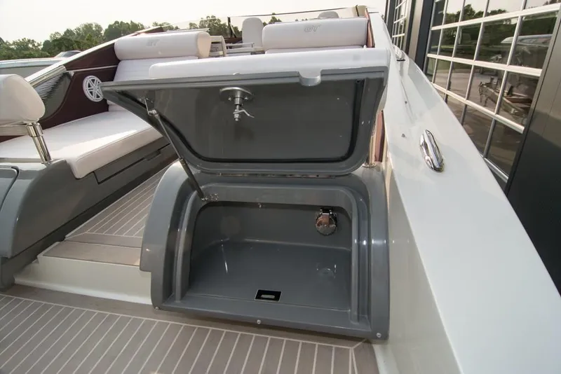 Slide: The Image of 2019 Donzi 41 GT boat with open storage compartment. - 7