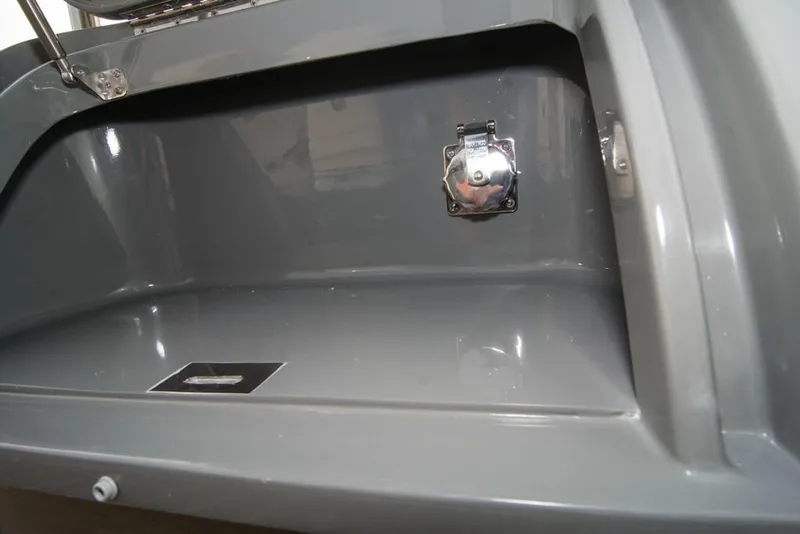 Slide: The Image of 2019 Donzi 41 GT storage compartment with chrome latch. - 8