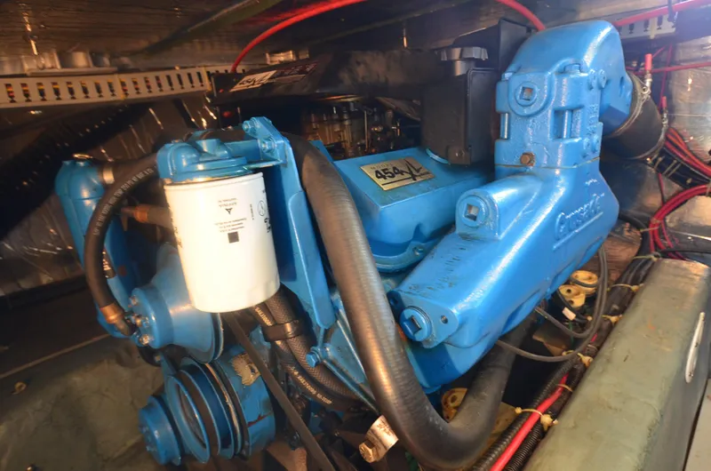 Slide: The Image of 1995 Carver 370 Voyager engine compartment with blue 454XL engine. - 26