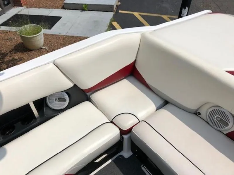Slide: The Image of Luxurious seating on 2012 Axis Wake Research A-22 boat with white and red upholstery. - 9