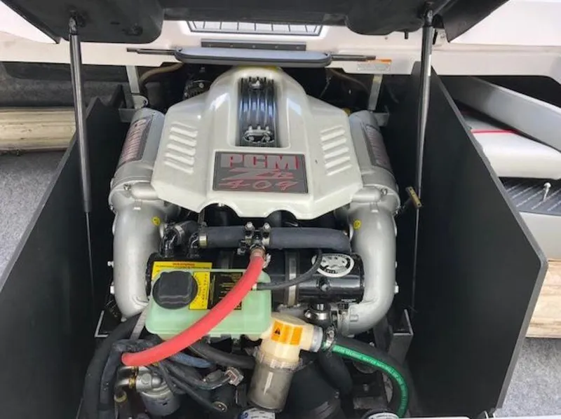 Slide: The Image of Engine of 2013 Nautique Super Air Nautique 230 boat, featuring PCM 5.7L V8. - 36