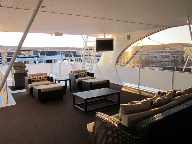 Slide: The Image of Luxurious 2011 Bravada Knot A Problem Share 6 houseboat with elegant outdoor seating area. - 12