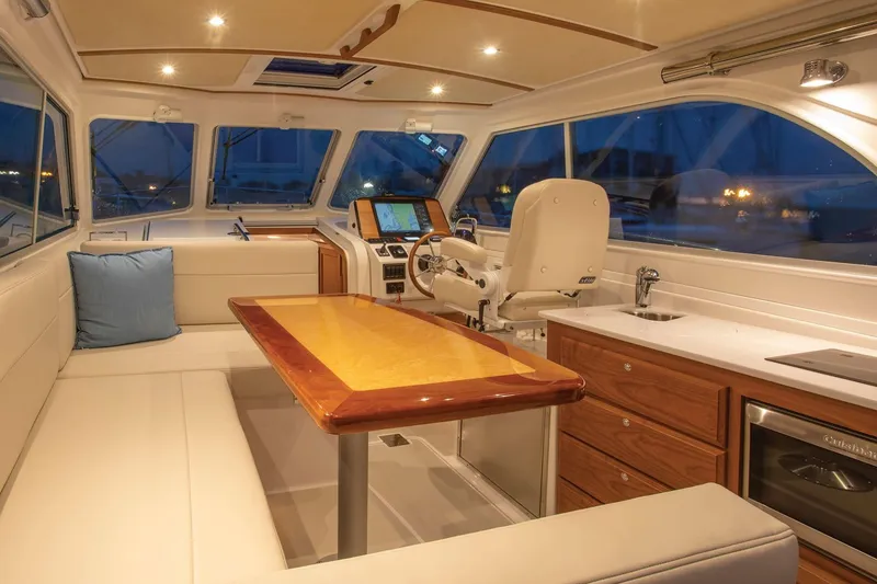 Slide: The Image of Luxurious interior of 2024 Back Cove 34O yacht with modern amenities and elegant design. - 24