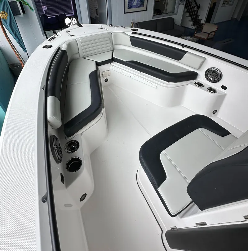 Slide: The Image of 2025 Edgewater 230CC Center Console boat interior with sleek seating and modern design. - 19