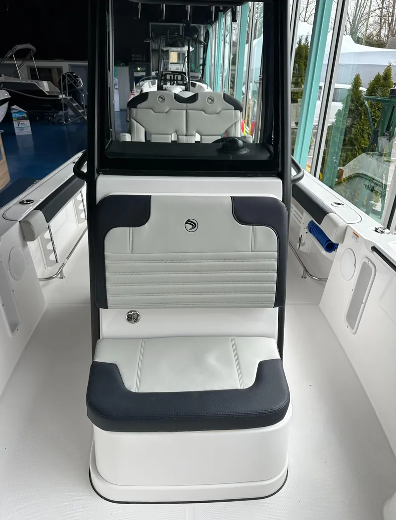 Slide: The Image of 2025 Edgewater 230CC Center Console boat interior with sleek seating and modern design. - 28