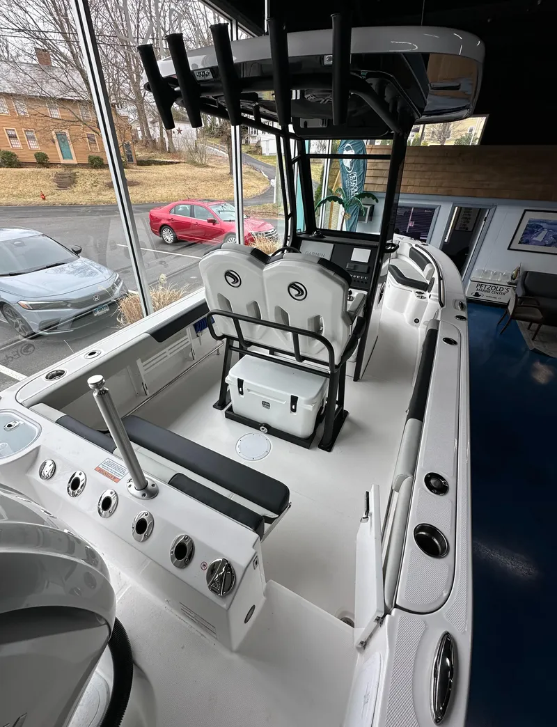Slide: The Image of 2025 Edgewater 230CC Center Console boat with sleek design and modern features. - 8