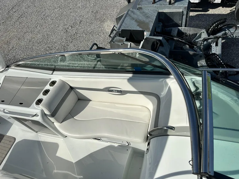 Slide: The Image of 2012 Formula 350 Sun Sport boat interior with white seating and cup holders. - 14