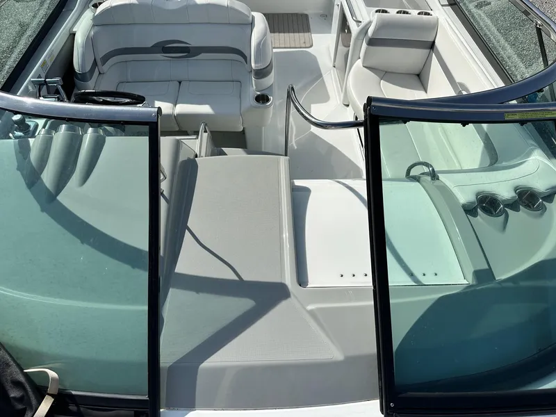 Slide: The Image of 2012 Formula 350 Sun Sport boat interior with white seating and open cockpit. - 19