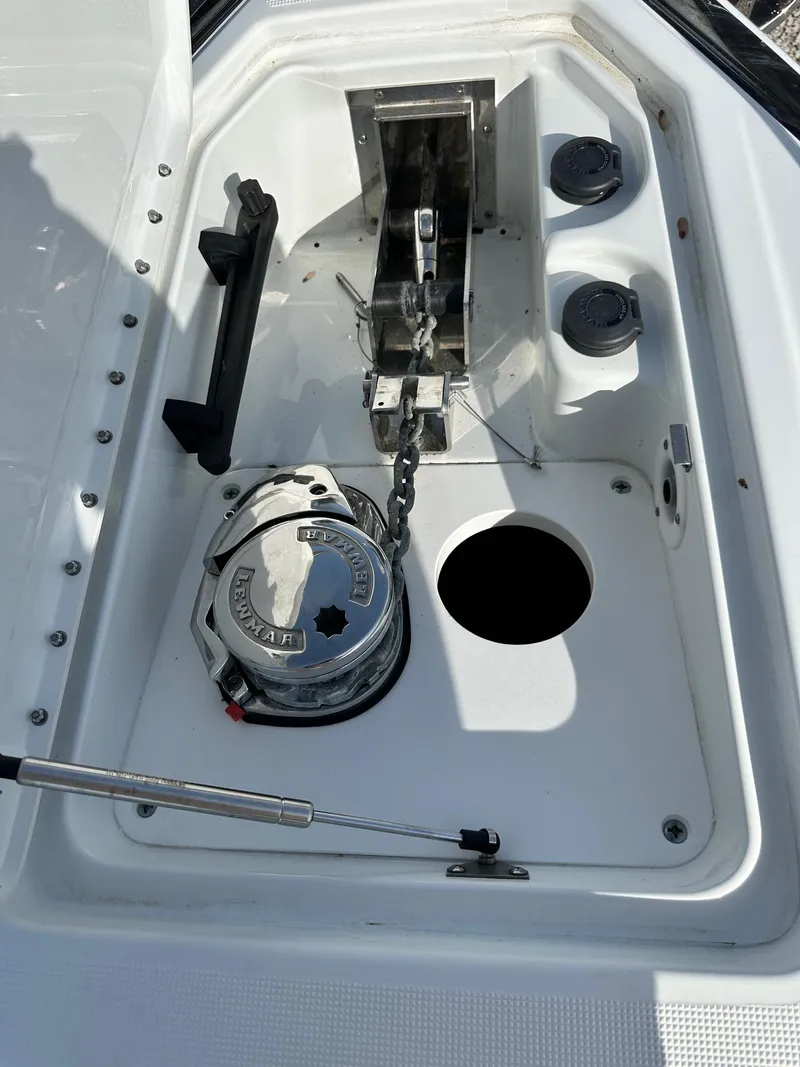 Slide: The Image of 2012 Formula 350 Sun Sport anchor locker with windlass and chain storage. - 23