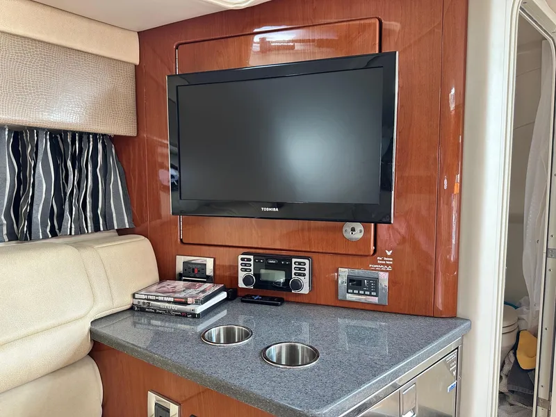 Slide: The Image of Interior of 2012 Formula 350 Sun Sport with TV, stereo, and countertop. - 32