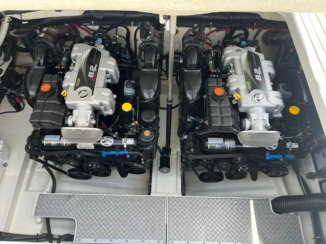 Slide: The Image of Twin engines of a 2012 Formula 350 Sun Sport boat, showcasing powerful marine engineering. - 41