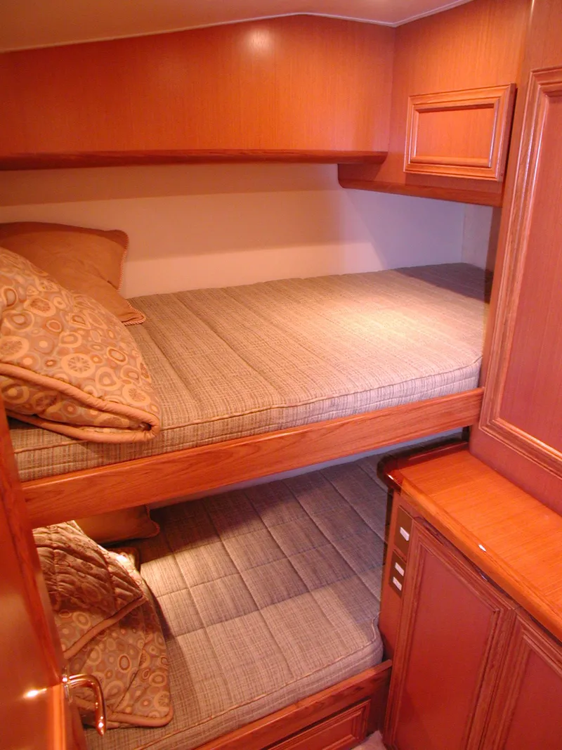 Slide: The Image of 2024 Jersey Cape 44' Custom yacht cabin with bunk beds. - 7