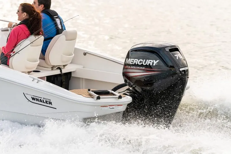 Slide: The Image of 2023 Boston Whaler 160 Super Sport with Mercury outboard motor on water. - 7