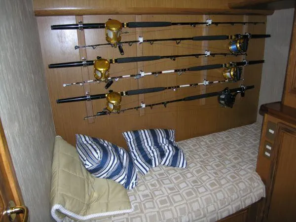 Slide: The Image of Fishing rods storage in cabin of 2024 Jersey Cape 48 Custom boat. - 7