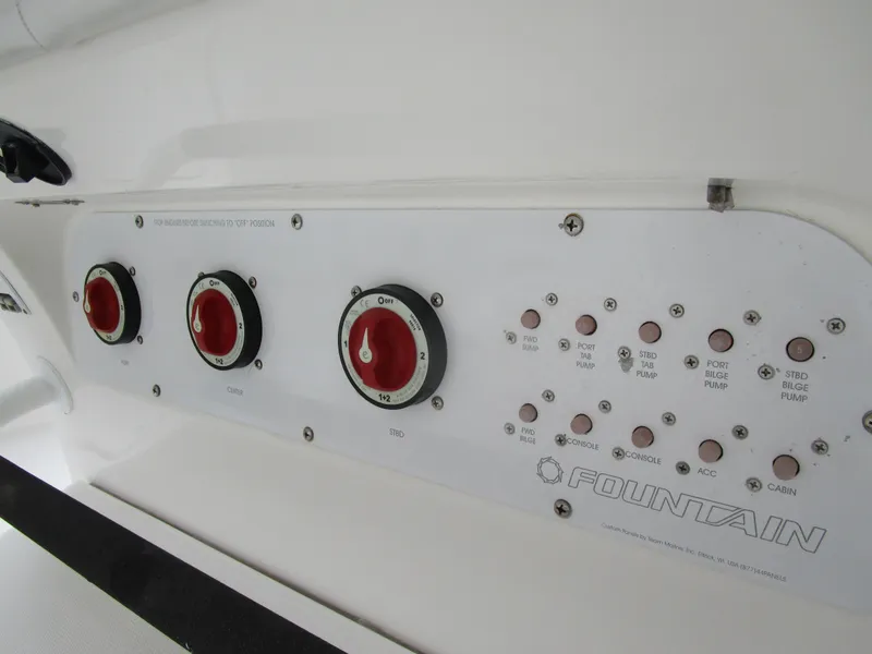 Slide: The Image of Control panel of 2007 Fountain 38 Tournament Edition with switches and indicators. - 19