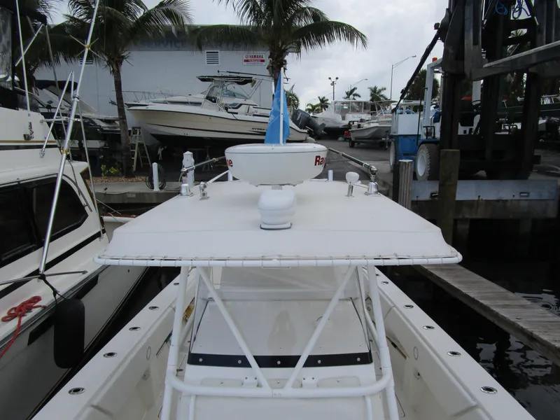 Slide: The Image of 2007 Fountain 38 Tournament Edition boat docked at marina. - 23