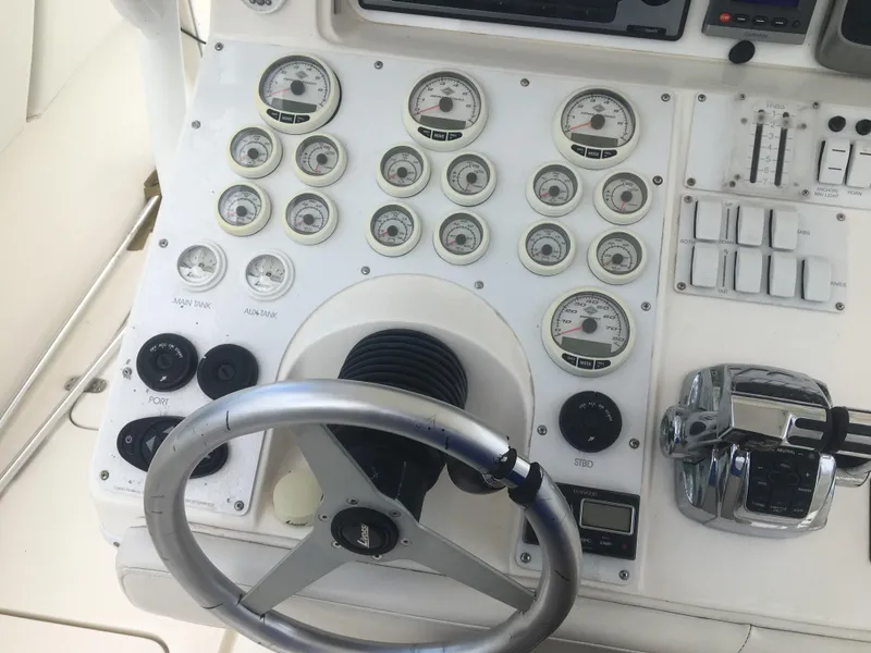 Slide: The Image of Control console of a 2007 Fountain 38 Tournament Edition boat. - 42