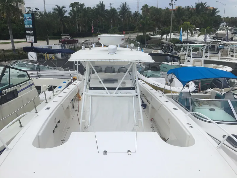 Slide: The Image of 2007 Fountain 38 Tournament Edition boat in marina. - 47