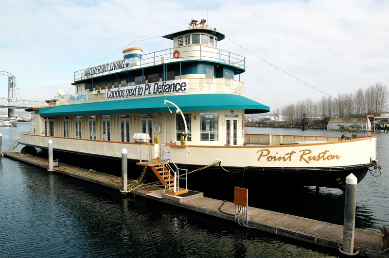 Slide: The Image of 1936 Custom Ferry Point Ruston docked at a pier. - 0