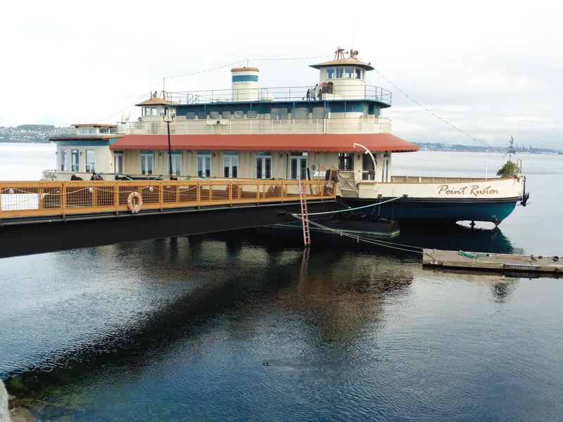 Slide: The Image of 1936 Custom Ferry Point Ruston docked on calm waters. - 15
