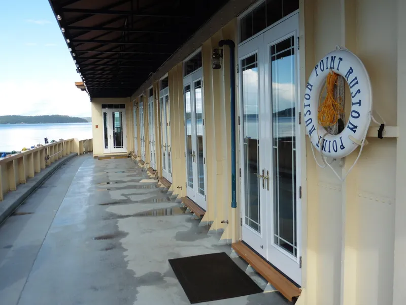 Slide: The Image of 1936 Custom Ferry with Point Ruston signage and waterfront view. - 18