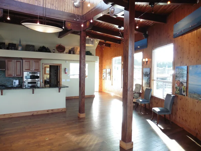 Slide: The Image of Spacious wooden interior of a 1936 custom Ferry with modern kitchen and large windows. - 41