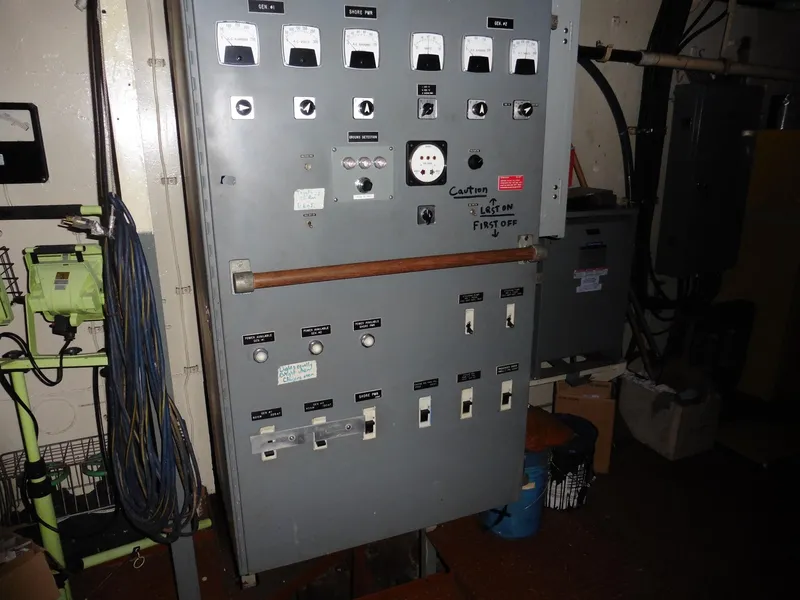 Slide: The Image of 1936 Ferry Custom control panel with switches and gauges in an industrial setting. - 46