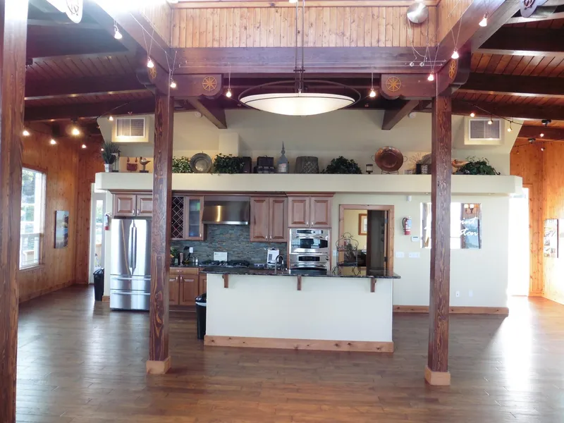 Slide: The Image of Spacious wooden kitchen with modern appliances and high ceilings in a 1936 custom Ferry model. - 47