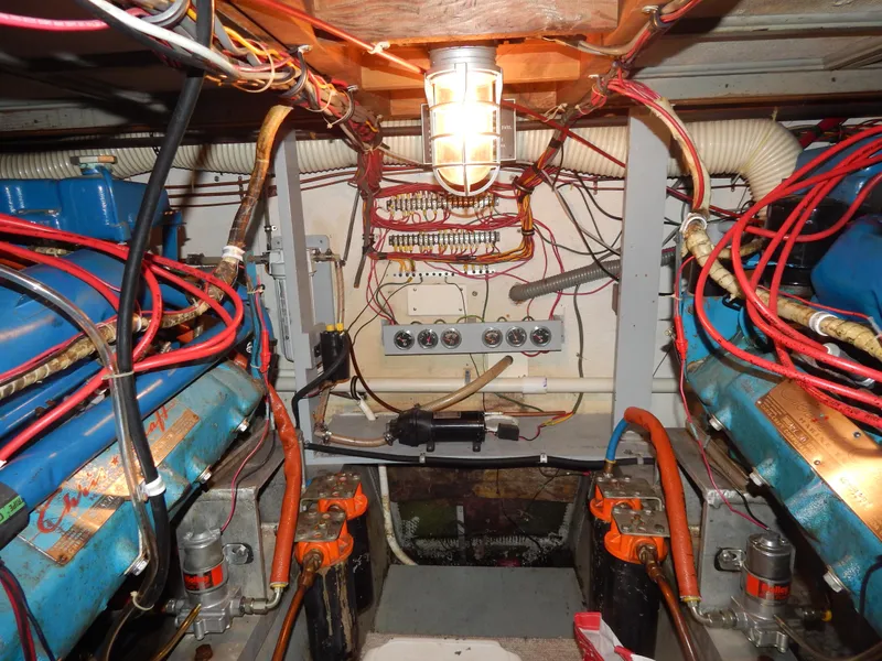 Slide: The Image of Engine room of 1972 Hatteras 38 Convertible with wiring and components visible. - 20