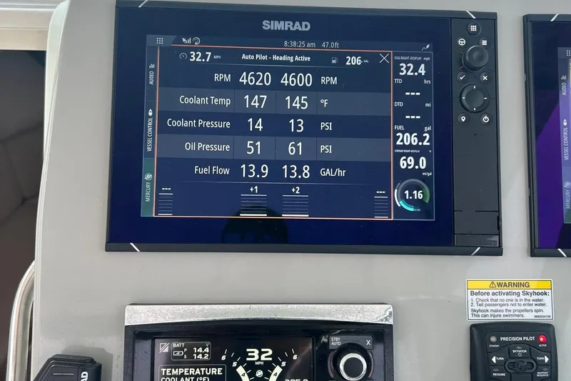 Slide: The Image of 2016 Boston Whaler 315 Conquest boat with dual Mercury engines docked at marina. - 17