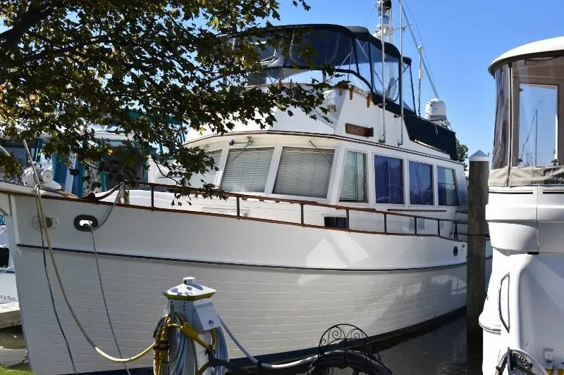 Slide: The Image of 1985 Grand Banks 49 Motoryacht docked in harbor. - 1
