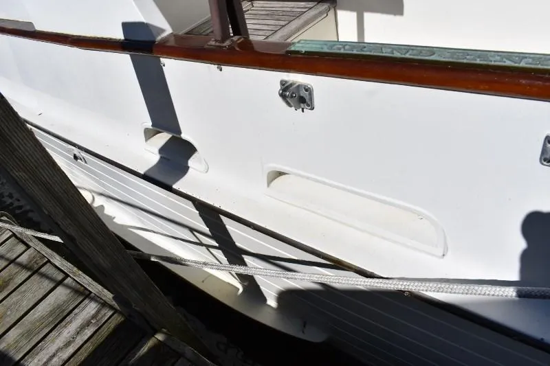 Slide: The Image of Close-up of 1985 Grand Banks 49 Motoryacht at dock. - 11
