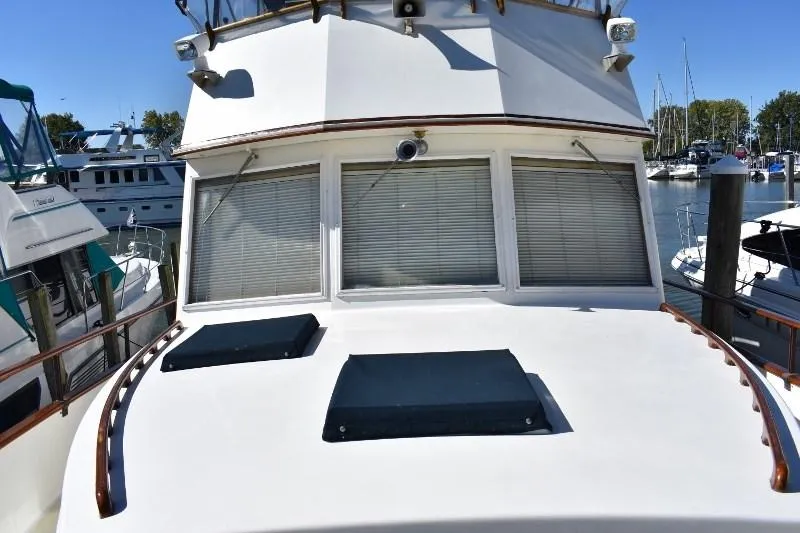 Slide: The Image of 1985 Grand Banks 49 Motoryacht docked, front view. - 18