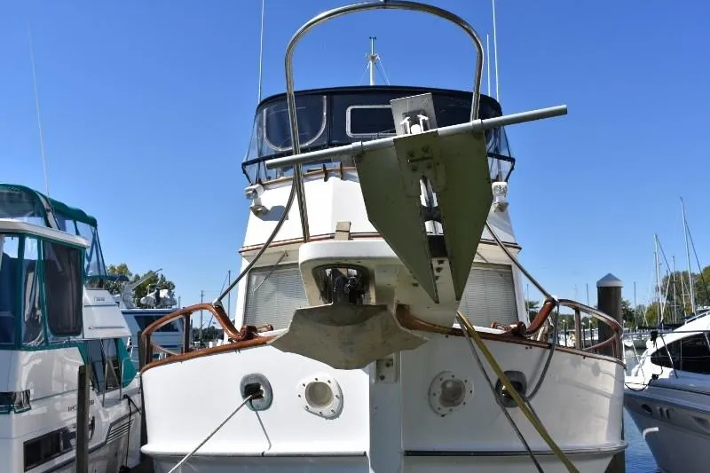 Slide: The Image of 1985 Grand Banks 49 Motoryacht docked, front view. - 3