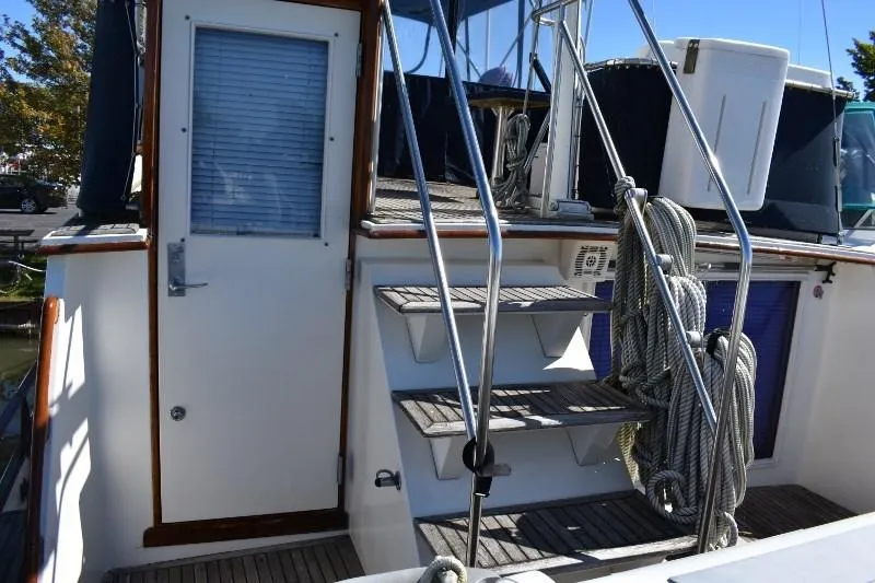 Slide: The Image of Grand Banks 49 Motoryacht 1985, stairway and door view. - 31