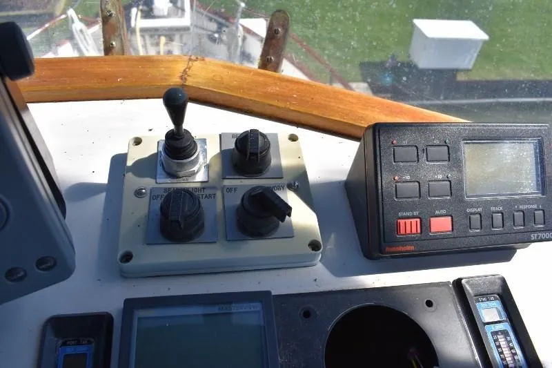 Slide: The Image of Control panel of a 1985 Grand Banks 49 Motoryacht. - 42
